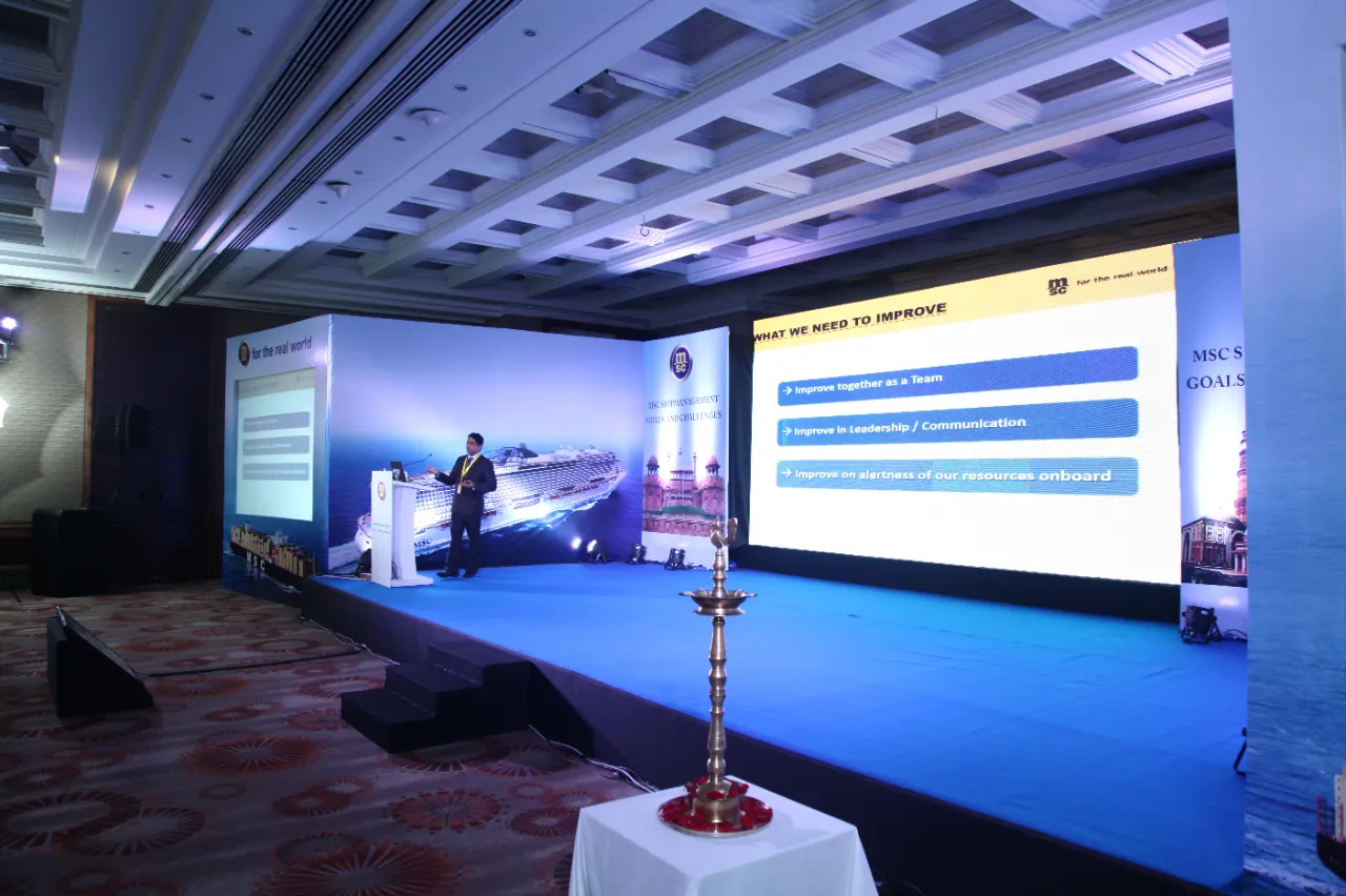 Corporate conference stage with inaugural lamp